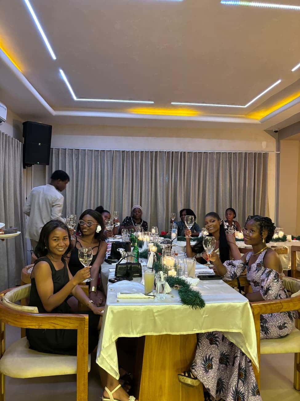 Guests at a candlelit dinner