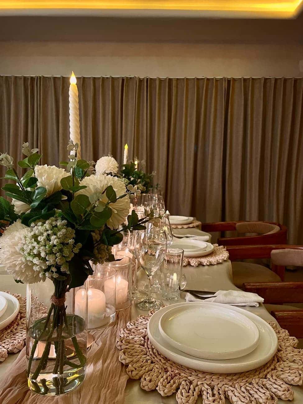 Long table set for elegant dinner