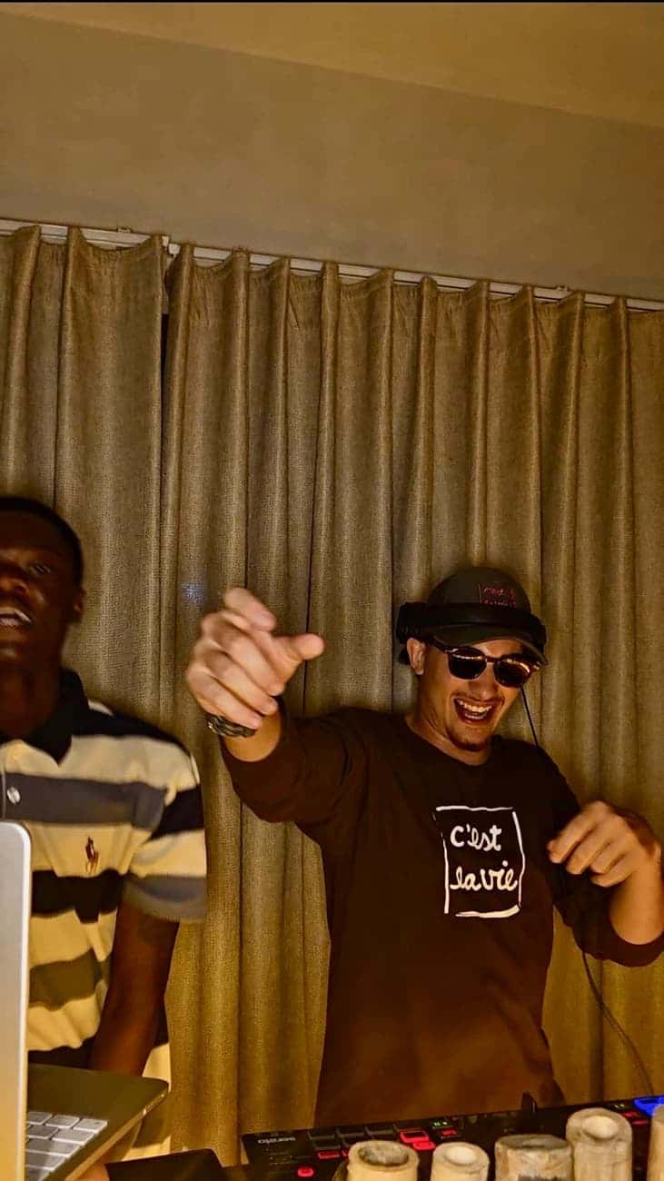 Smiling DJ animating the party
