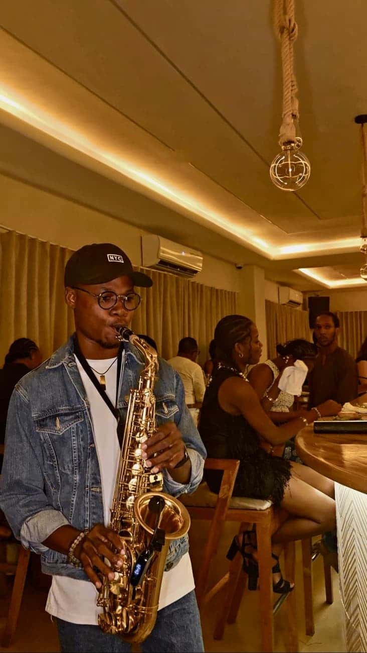 Saxophonist performing in the room