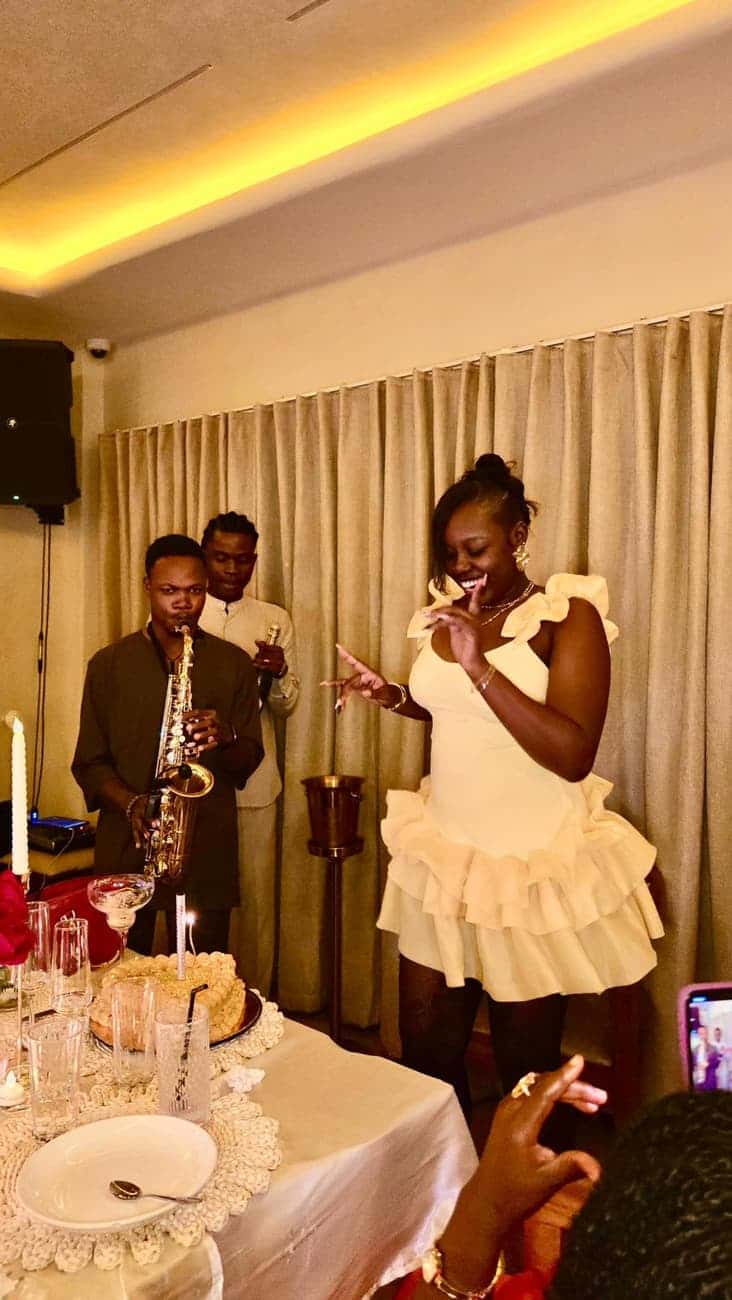 Guest dancing, saxophonist at a party